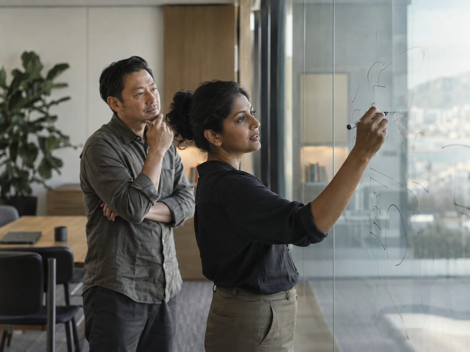 CTO reviewing an architecture sketch