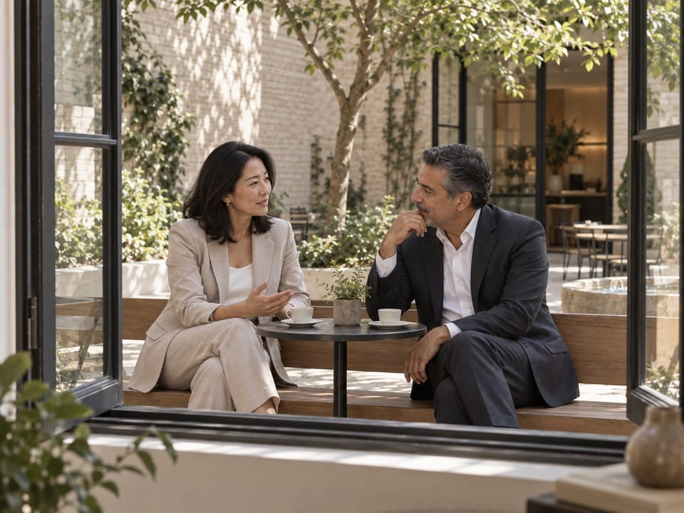 Two CPG executives in a quiet corner conversation